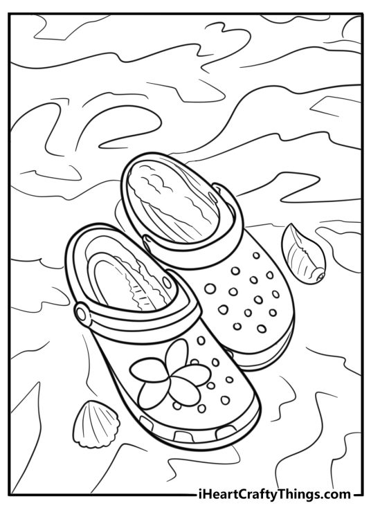 Crocs on a sandy beach with shells coloring page