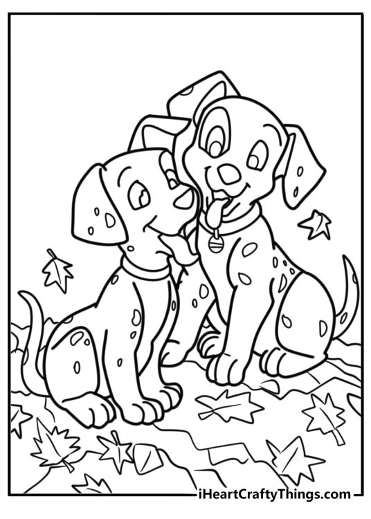 Dalmatian puppies playing in a pile of leaves coloring page