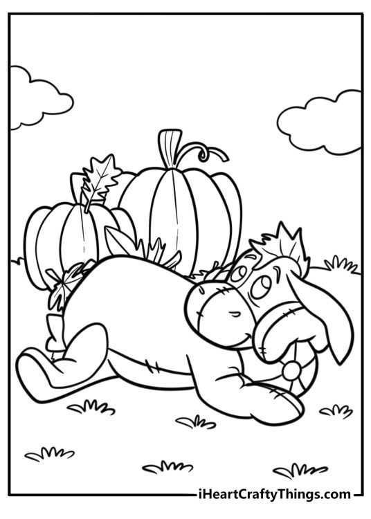 Eeyore resting next to a pumpkin coloring sheet