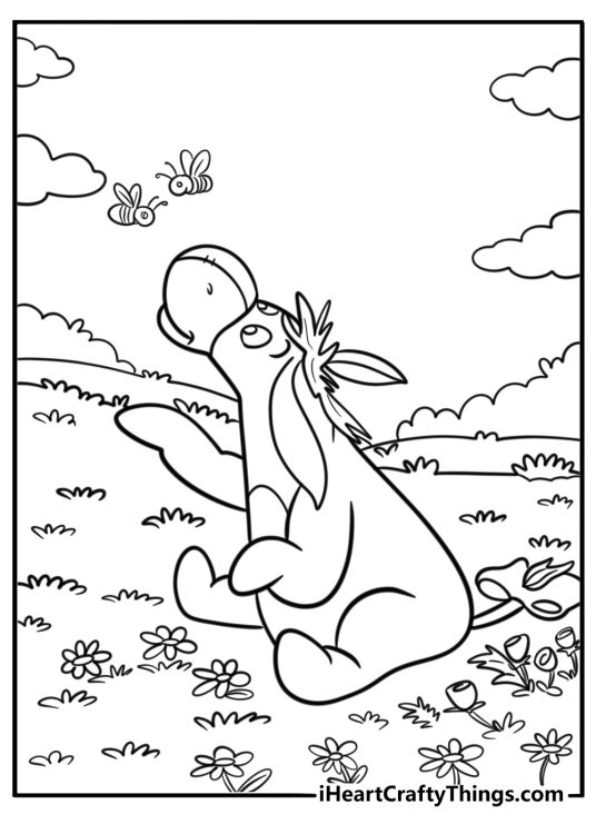 Eeyore sitting in a field of flowers coloring page