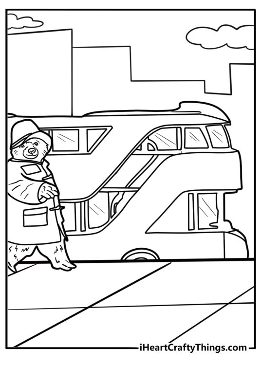 Paddington riding on a red London bus coloring page