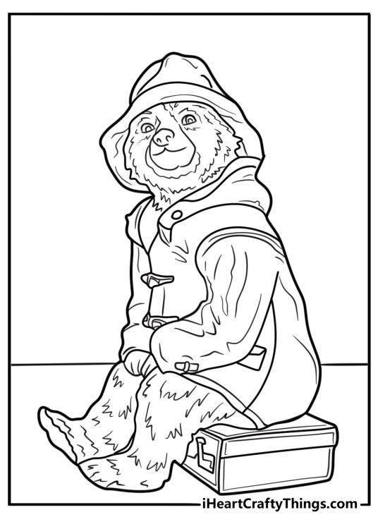 Paddington sitting on a suitcase coloring page