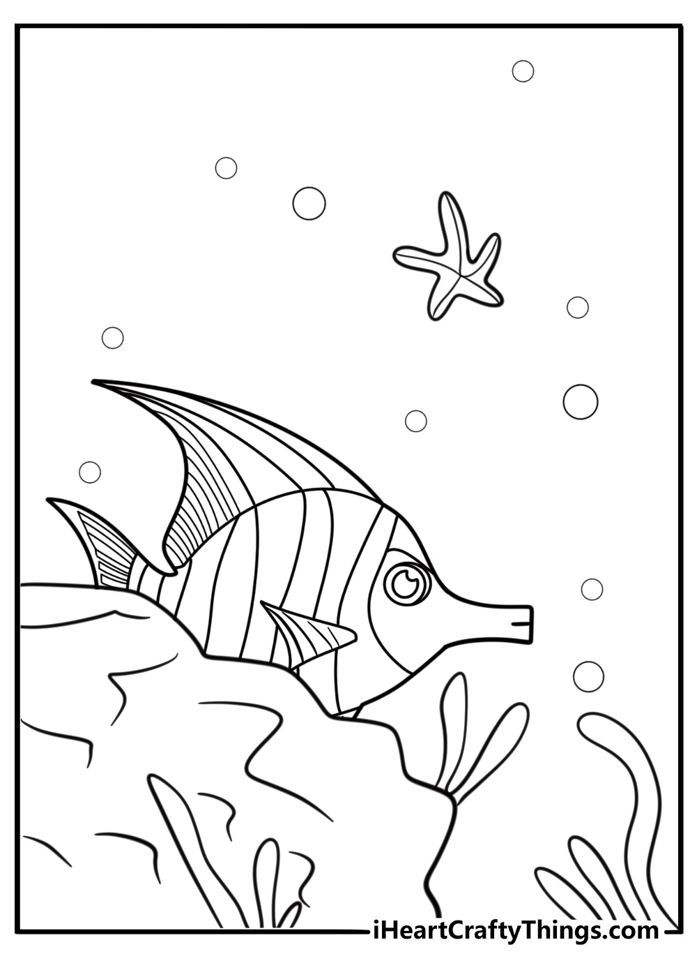Angelfish hiding behind rocks coloring page