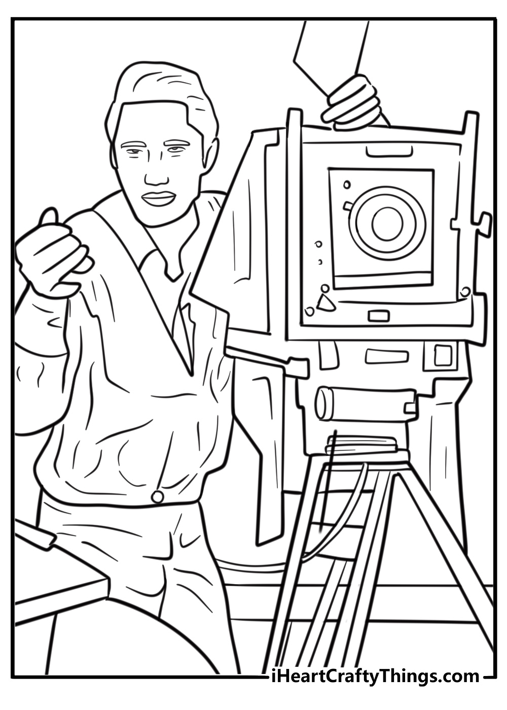 Elvis with a movie camera on a film set coloring page