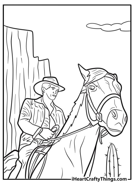Indiana Jones riding a horse in the desert coloring page