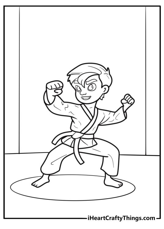 Karate black belt standing in ready stance coloring page