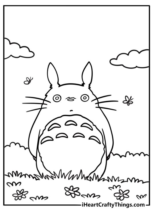 Totoro standing next to a garden coloring page