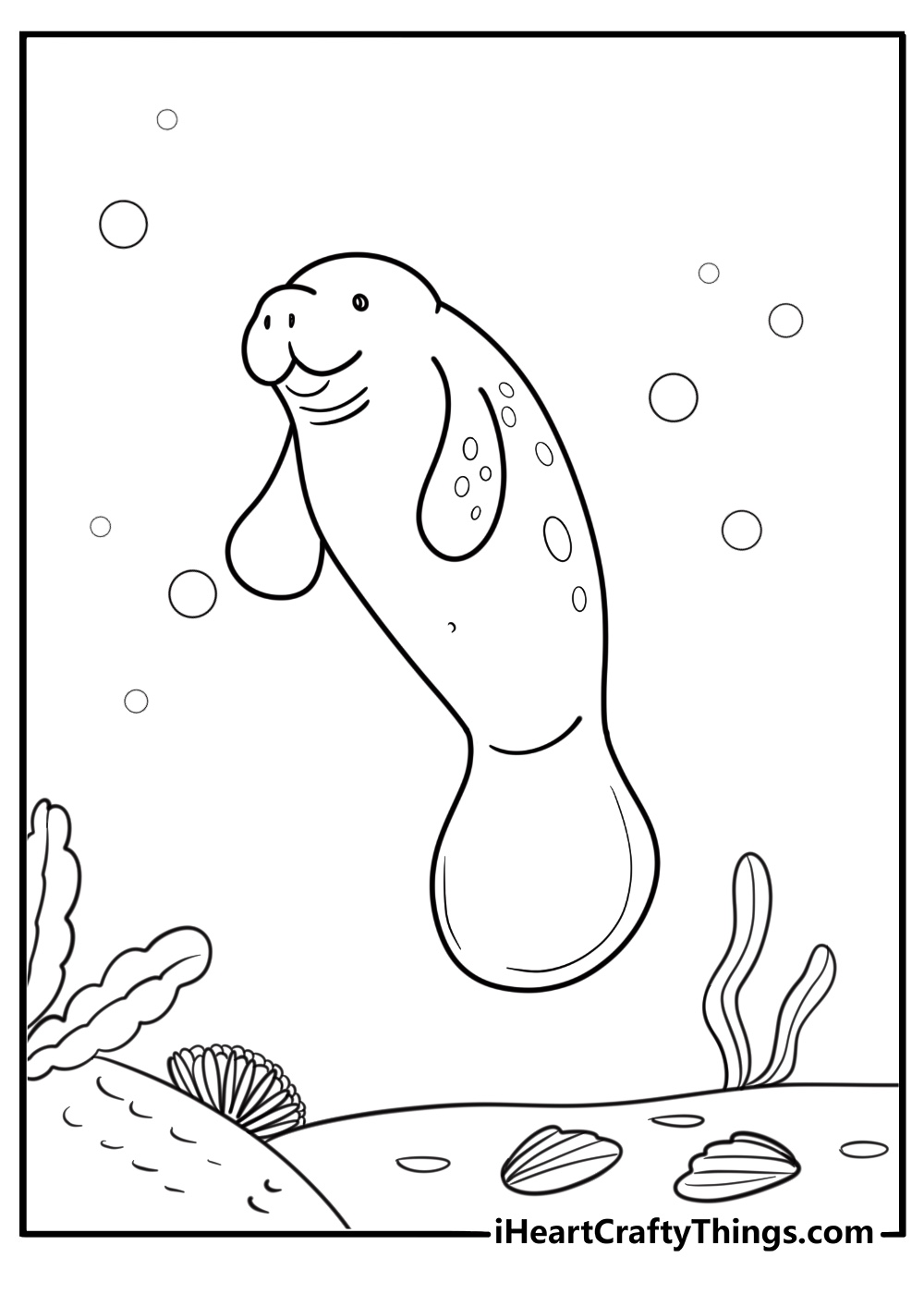 Manatee near coral reef free coloring page pdf