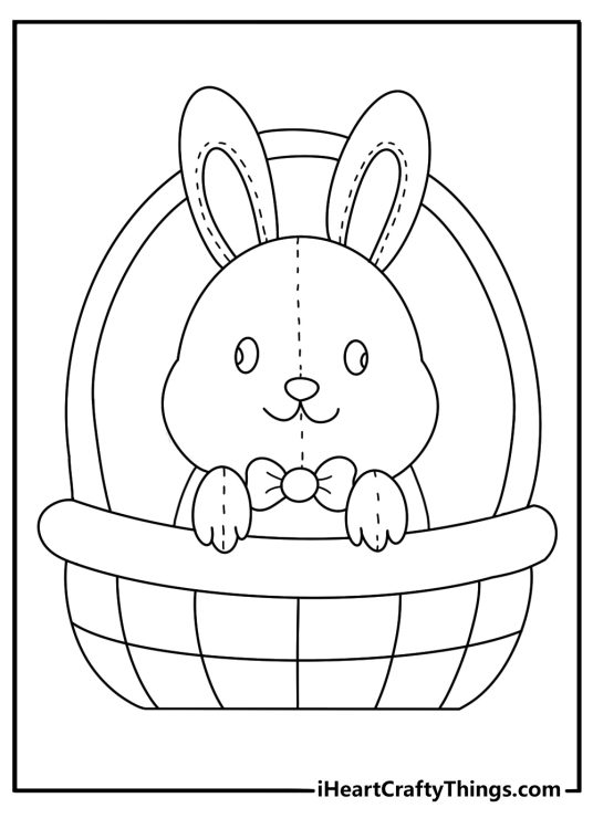 Cute toy coloring page with a plush bunny sitting in a basket