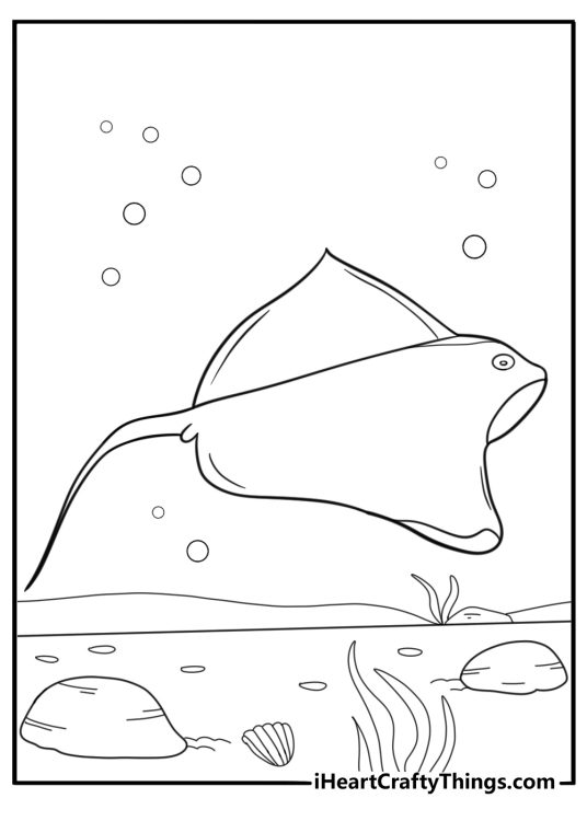 Stingray swimming near coral reef coloring page for kids