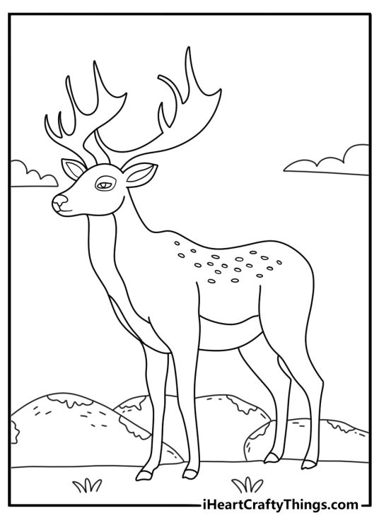 A forest deer stands beside a mossy stone in this printable sheet