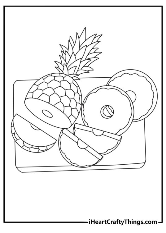 Free printable pineapple sheet featuring slices on a wooden cutting board