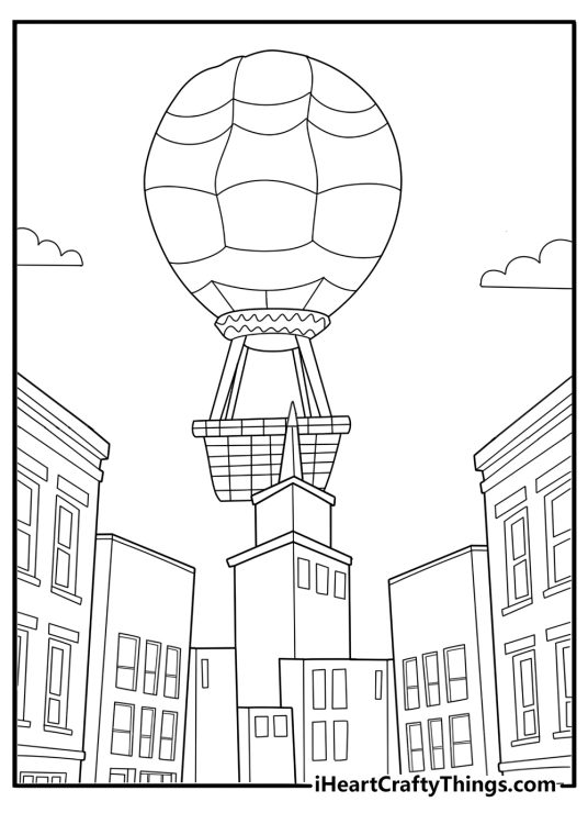 Cartoon hot air balloon flying over a town fun coloring sheet