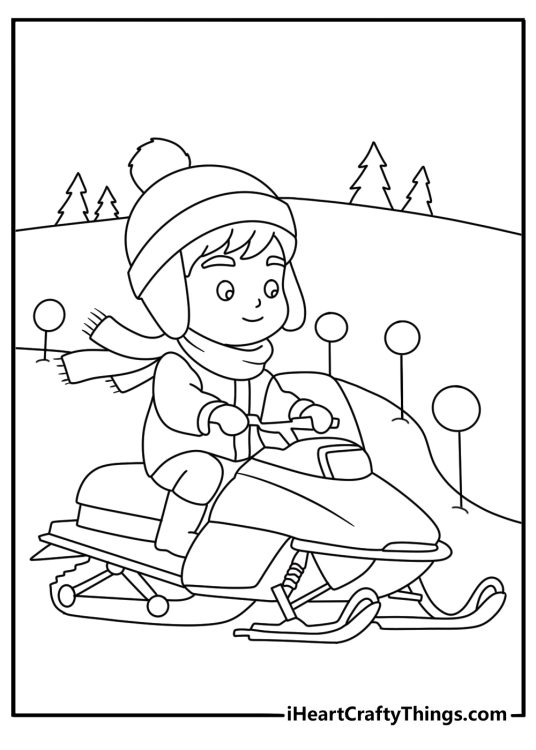 A child rides a snowmobile along a marked winter trail
