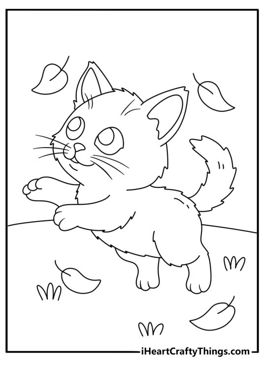 Printable cat picture featuring a kitten chasing fallen leaves