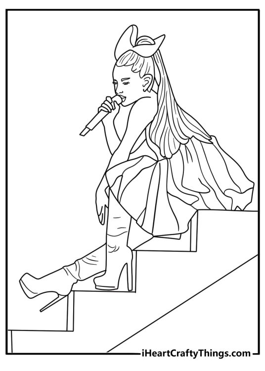 ariana grande printable pdf showing her sitting on stage stairs holding a microphone